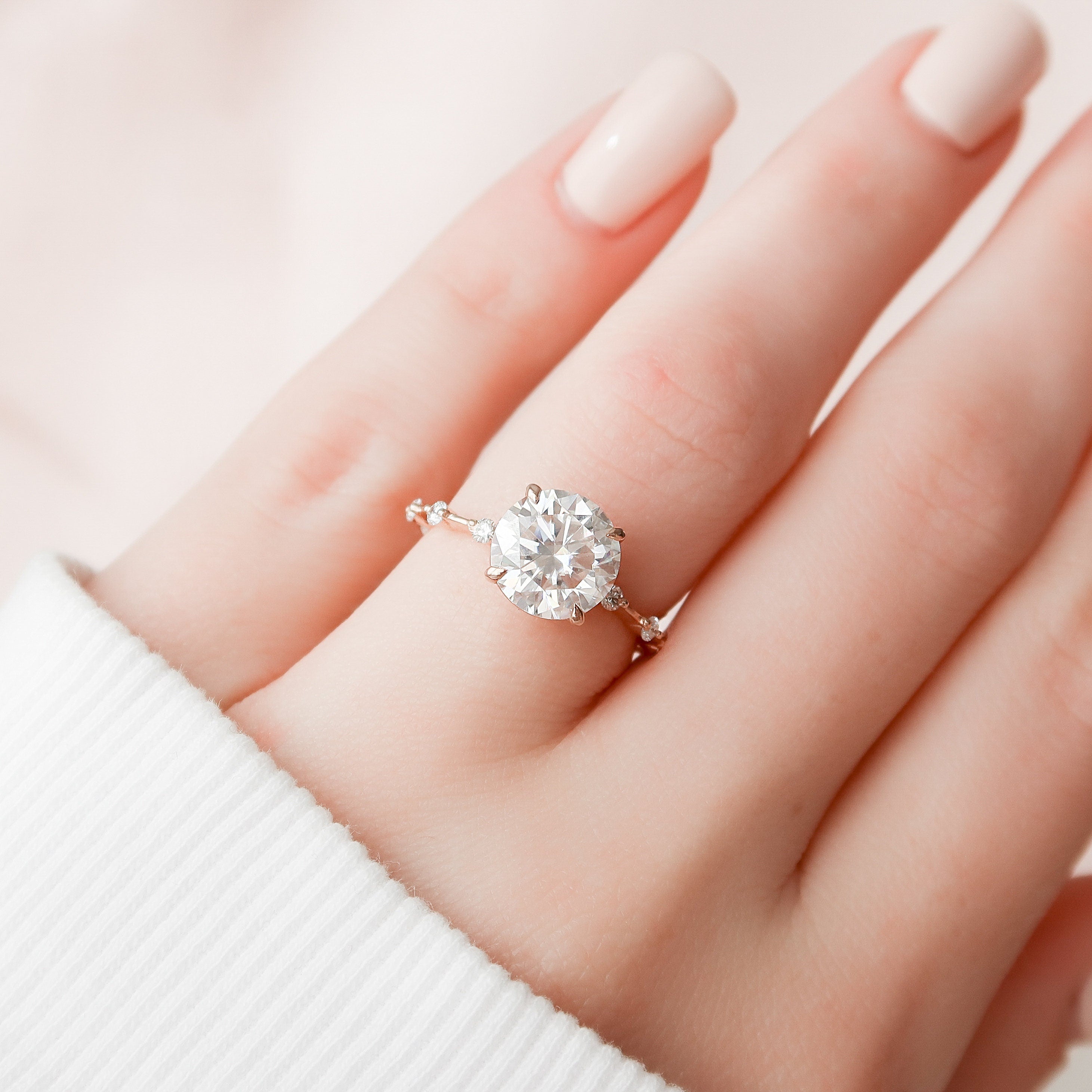 Dainty round hot sale engagement rings